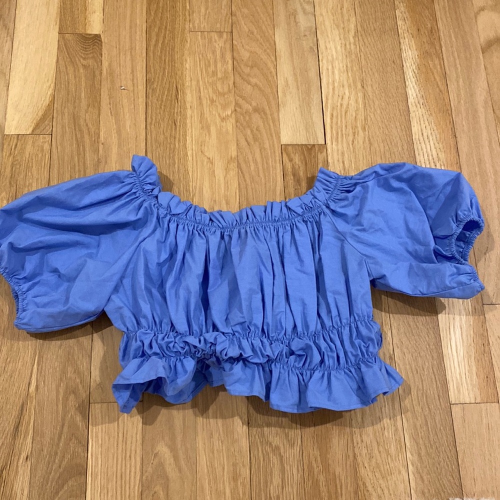 Blue off the shoulder shirt from Zara